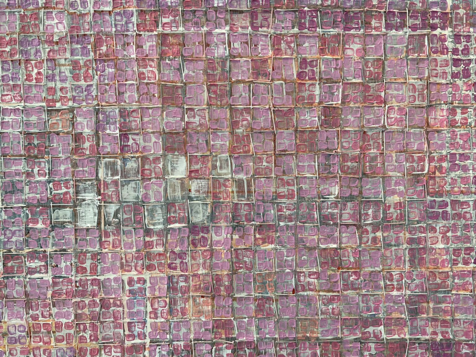 A collage of different colored squares and tiles.